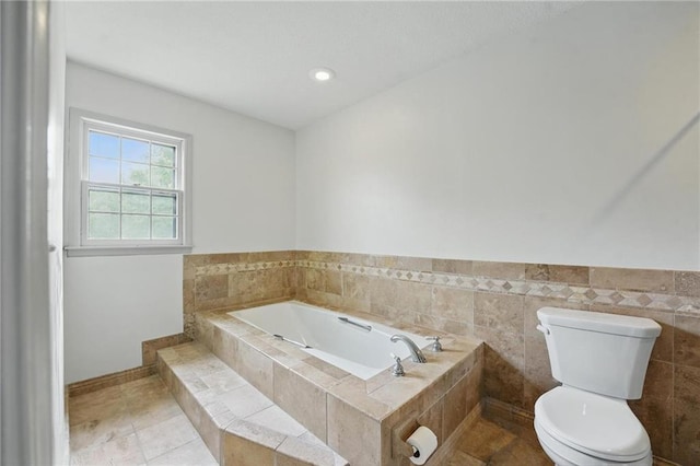 3632 NW Blue Jacket Dr, Lees Summit, MO 64064 - bathroom with a bath, toilet, and tile patterned flooring