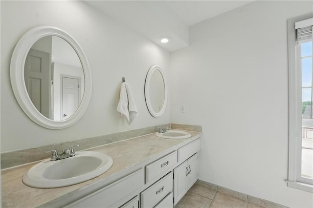 3632 NW Blue Jacket Dr, Lees Summit, MO 64064 - full bath featuring double vanity and tile patterned flooring