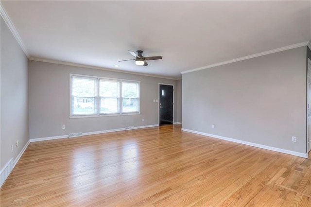 5917 W 101st Ter, Overland Park, KS 66207 - spare room with ceiling fan, light wood-style floors, and ornamental molding