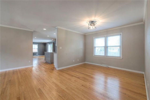 5917 W 101st Ter, Overland Park, KS 66207 - unfurnished room with light wood finished floors, crown molding, and recessed lighting