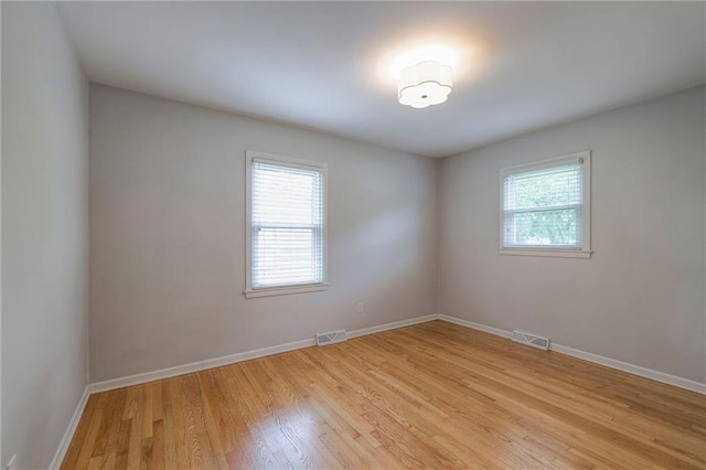 5917 W 101st Ter, Overland Park, KS 66207 - unfurnished room with light wood-style floors and baseboards