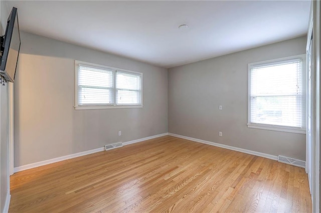 5917 W 101st Ter, Overland Park, KS 66207 - spare room with light wood finished floors and baseboards