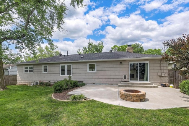 5917 W 101st Ter, Overland Park, KS 66207 - rear view of house featuring a patio area, a chimney, and an outdoor fire pit