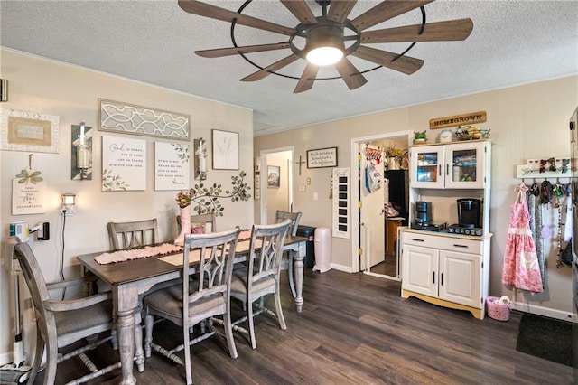 302 W 4th St, Waverly, KS 66871 - dining room featuring dark wood-style floors, ceiling fan, and a textured ceiling