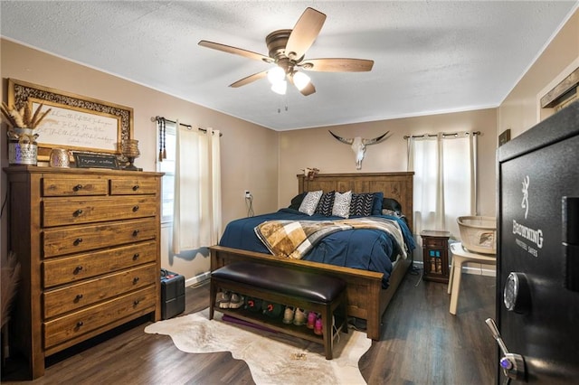302 W 4th St, Waverly, KS 66871 - bedroom featuring wood finished floors, a textured ceiling, and a ceiling fan