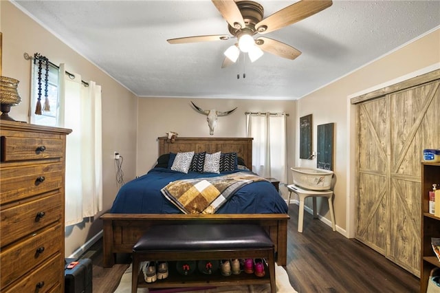 302 W 4th St, Waverly, KS 66871 - bedroom featuring wood finished floors, baseboards, ceiling fan, crown molding, and a textured ceiling