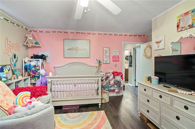 302 W 4th St, Waverly, KS 66871 - bedroom featuring a textured ceiling, dark wood-type flooring, and ceiling fan