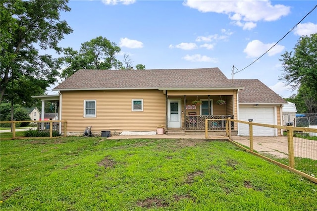 302 W 4th St, Waverly, KS 66871 - view of front of property featuring covered porch, concrete driveway, and a garage