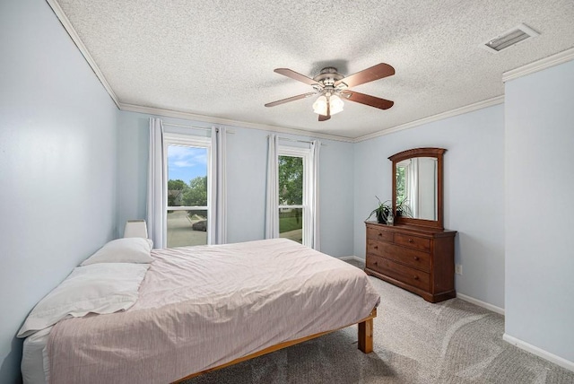 11601 Conser St, Overland Park, KS 66210 - bedroom featuring crown molding, a textured ceiling, carpet floors, ceiling fan, and baseboards