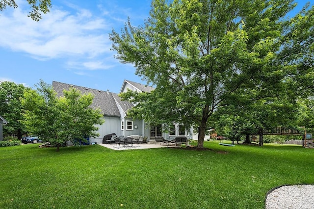 11601 Conser St, Overland Park, KS 66210 - view of green lawn featuring a patio area