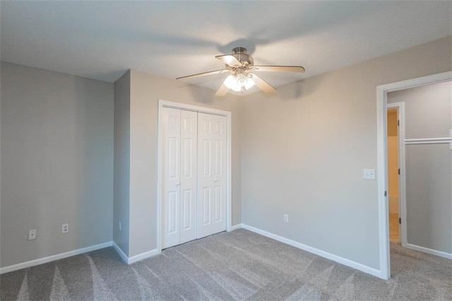7503 N Lewis Ave, Kansas City, MO 64158 - unfurnished bedroom with carpet, a closet, and ceiling fan