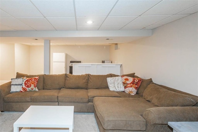 7503 N Lewis Ave, Kansas City, MO 64158 - carpeted living area featuring a paneled ceiling and recessed lighting
