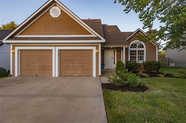 7503 N Lewis Ave, Kansas City, MO 64158 - traditional-style house featuring driveway, a front lawn, a garage, a chimney, and roof with shingles