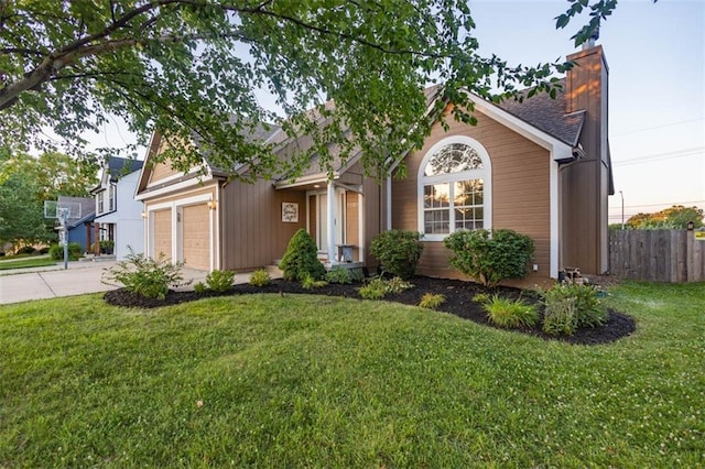 7503 N Lewis Ave, Kansas City, MO 64158 - single story home featuring an attached garage, a chimney, and concrete driveway