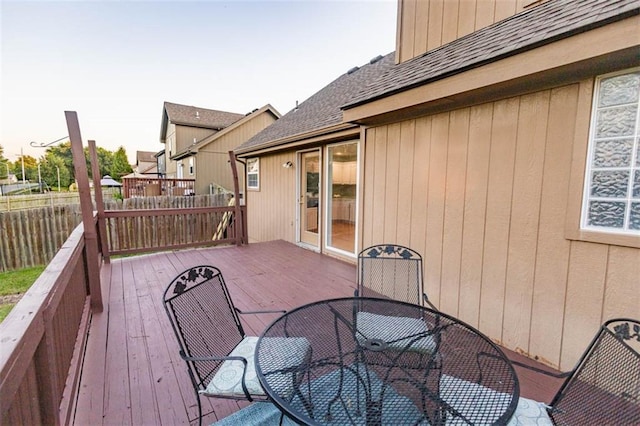 7503 N Lewis Ave, Kansas City, MO 64158 - wooden terrace with outdoor dining space