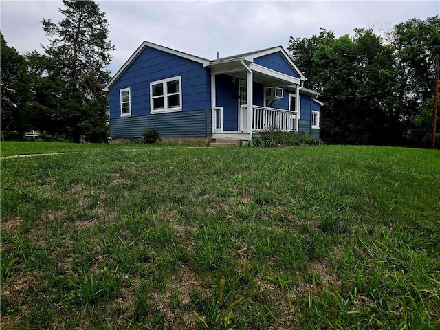 403 S Washington St, Rock Port, MO 64482 - view of front of home featuring covered porch and a front lawn
