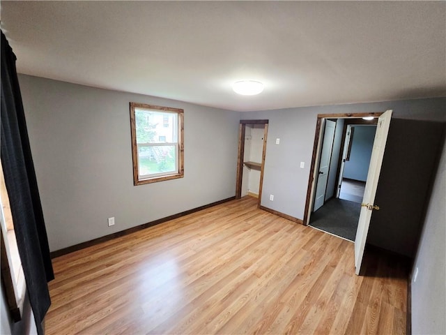 403 S Washington St, Rock Port, MO 64482 - unfurnished bedroom with light wood-style flooring and baseboards