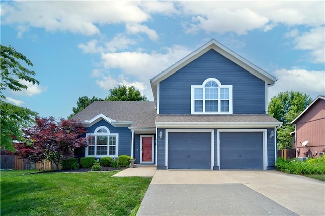 610 SE Joel Ave, Lees Summit, MO 64063 - traditional-style home with a garage, concrete driveway, and roof with shingles