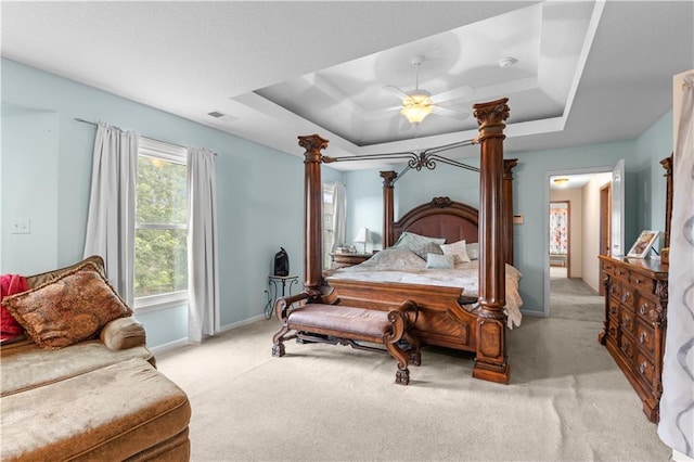 4022 SW Flintrock Dr, Lees Summit, MO 64082 - bedroom with carpet floors, a raised ceiling, a ceiling fan, and baseboards