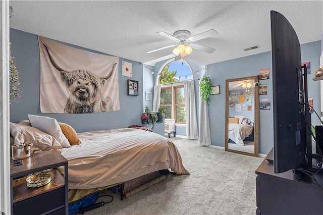 4022 SW Flintrock Dr, Lees Summit, MO 64082 - carpeted bedroom featuring a textured ceiling, a ceiling fan, and baseboards