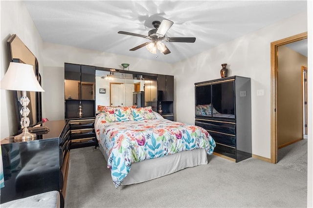 4022 SW Flintrock Dr, Lees Summit, MO 64082 - bedroom with light carpet, baseboards, and a ceiling fan