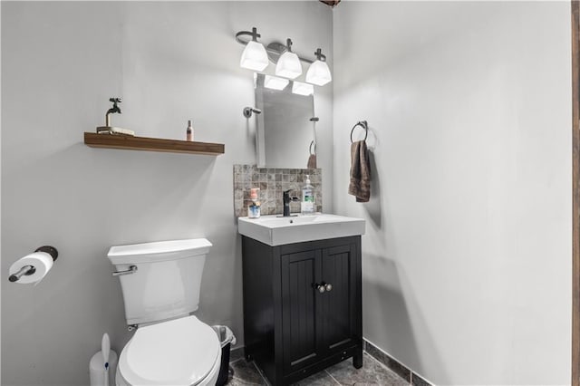 4022 SW Flintrock Dr, Lees Summit, MO 64082 - bathroom featuring toilet, vanity, and baseboards