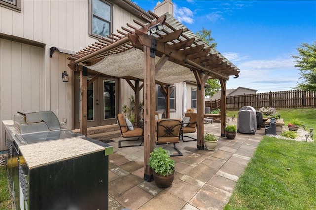 4022 SW Flintrock Dr, Lees Summit, MO 64082 - view of patio with a pergola, french doors, and exterior kitchen