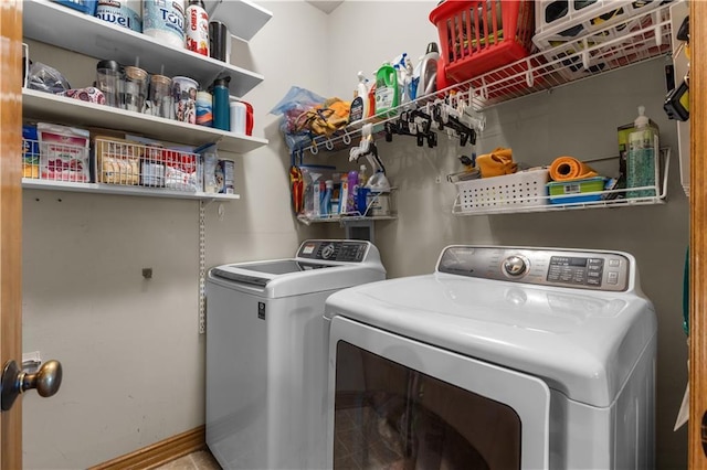 4022 SW Flintrock Dr, Lees Summit, MO 64082 - laundry room featuring separate washer and dryer and baseboards