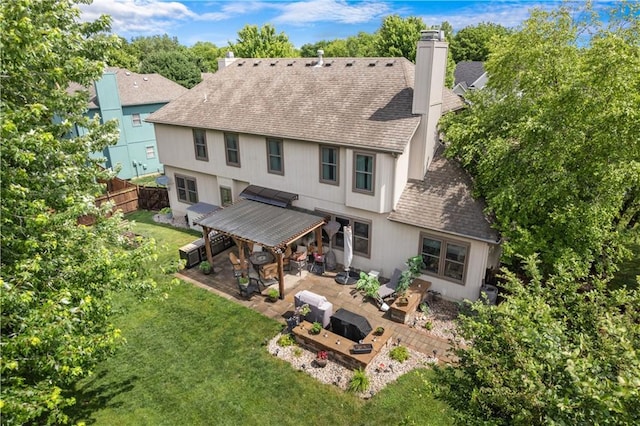 4022 SW Flintrock Dr, Lees Summit, MO 64082 - back of house with a shingled roof, a chimney, and a patio
