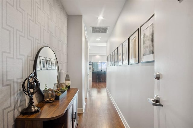 1101 Walnut St Unit 1809, Kansas City, MO 64106 - hall with dark wood-type flooring, baseboards, and recessed lighting