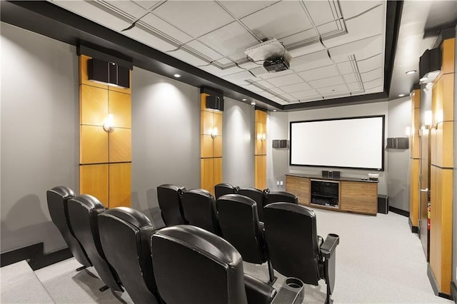1101 Walnut St Unit 1809, Kansas City, MO 64106 - home theater with carpet flooring, a raised ceiling, baseboards, and a drop ceiling