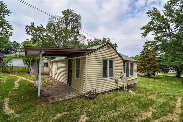 10908 E 66th St, Raytown, MO 64133 - view of property exterior featuring a yard