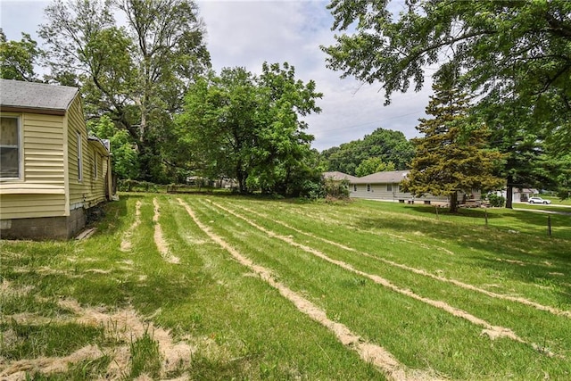 10908 E 66th St, Raytown, MO 64133 - view of green lawn