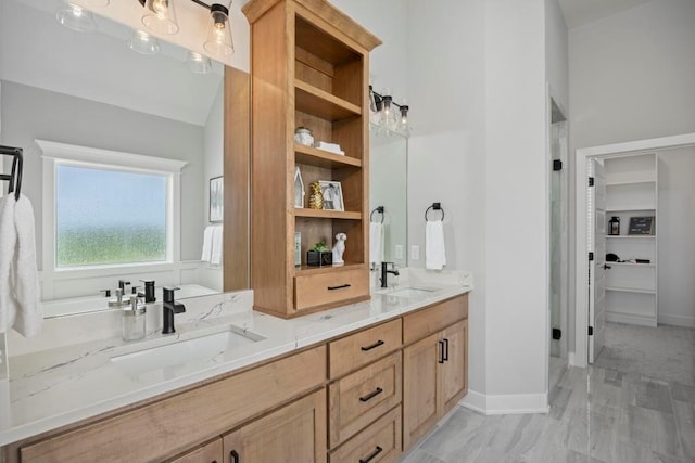 22112 W 80th Ter, Shawnee, KS 66220 - full bathroom with double vanity and baseboards