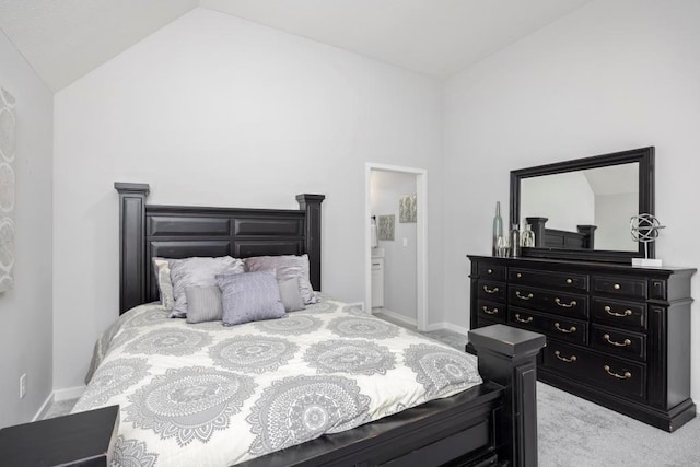 22112 W 80th Ter, Shawnee, KS 66220 - bedroom with lofted ceiling, carpet flooring, baseboards, and ensuite bathroom