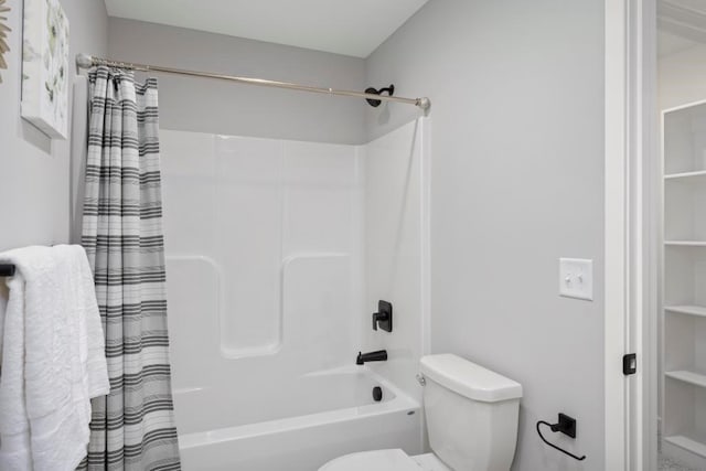 22112 W 80th Ter, Shawnee, KS 66220 - bathroom featuring shower / tub combo with curtain and toilet