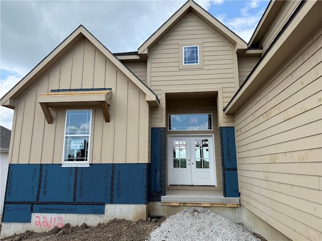22112 W 80th Ter, Shawnee, KS 66220 - property entrance with board and batten siding and french doors