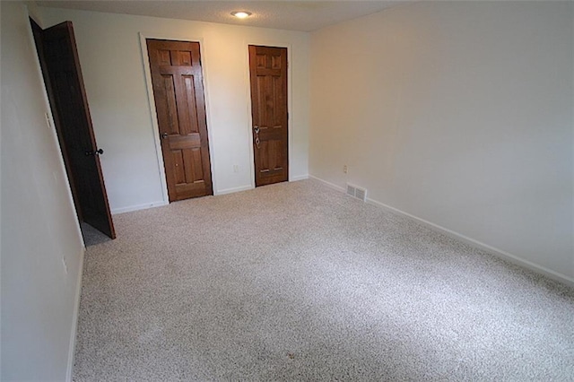 515 Mulberry St, Lees Summit, MO 64086 - unfurnished bedroom with carpet floors and baseboards