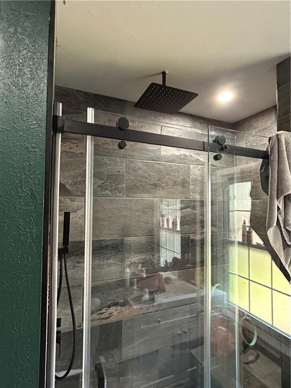 112 W Neosho St, Iola, KS 66749 - bathroom featuring a stall shower