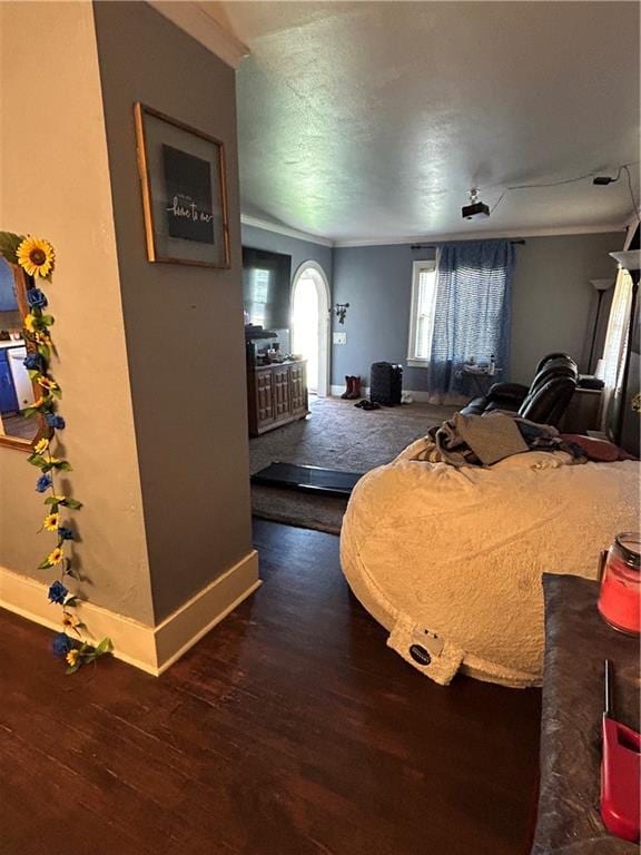 112 W Neosho St, Iola, KS 66749 - bedroom with baseboards and wood finished floors