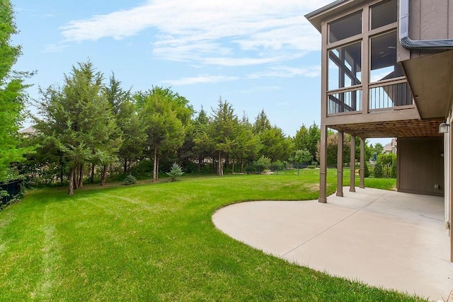 24793 W 98th St, Lenexa, KS 66227 - view of grassy yard with a patio and view of scattered trees