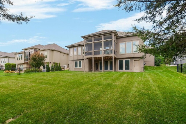 24793 W 98th St, Lenexa, KS 66227 - rear view of property with a sunroom and stucco siding