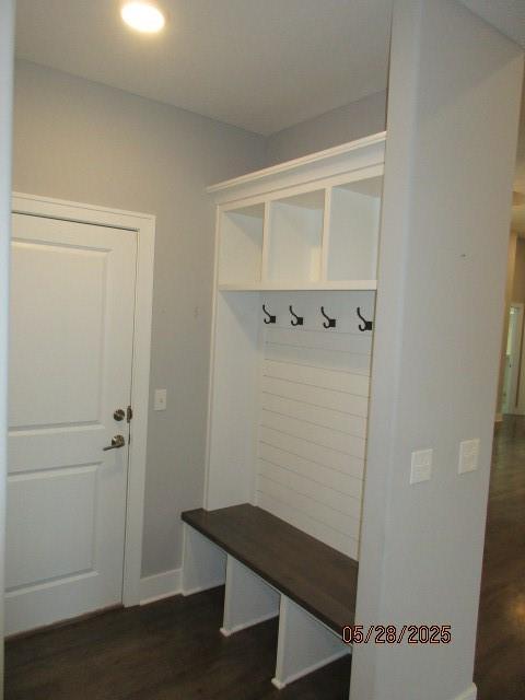 7031 N London Ave, Kansas City, MO 64151 - mudroom with dark wood-style flooring and baseboards