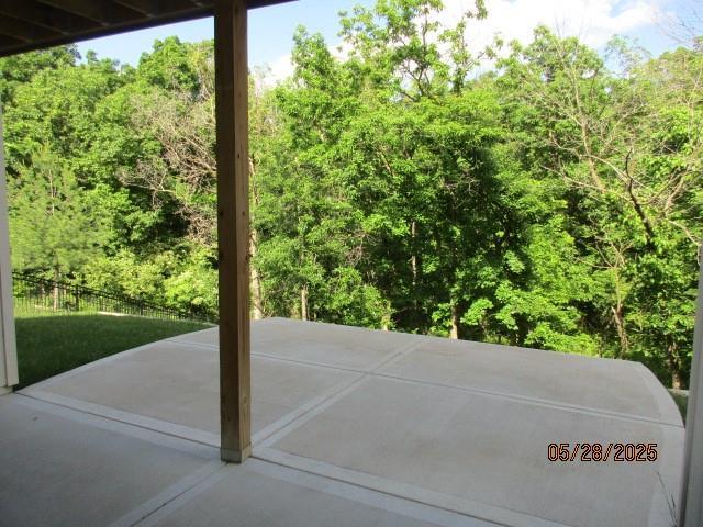 7031 N London Ave, Kansas City, MO 64151 - view of patio with a view of trees