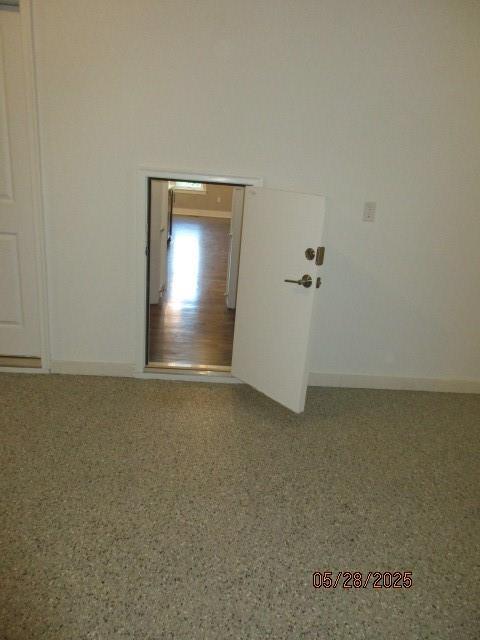 7031 N London Ave, Kansas City, MO 64151 - carpeted spare room with baseboards