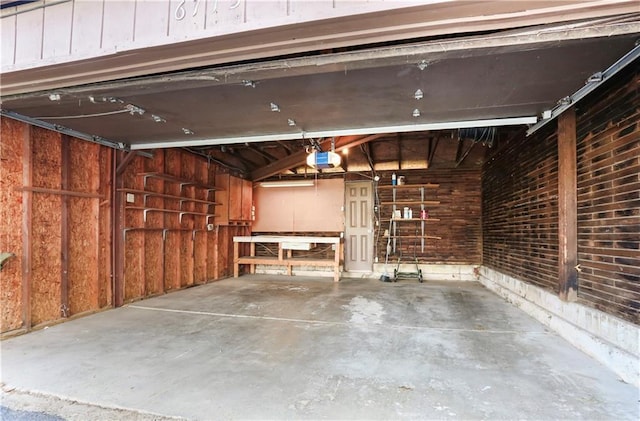 6773 N Askew Cir, Gladstone, MO 64119 - garage with a garage door opener