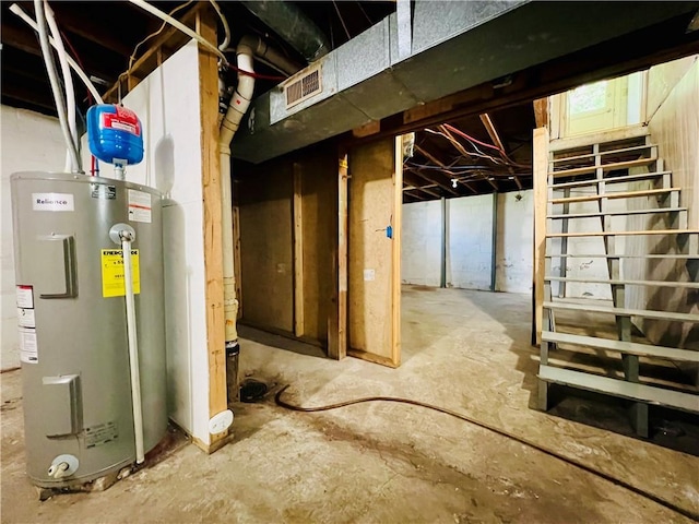 211 W 22nd St, Higginsville, MO 64037 - unfinished basement with electric water heater