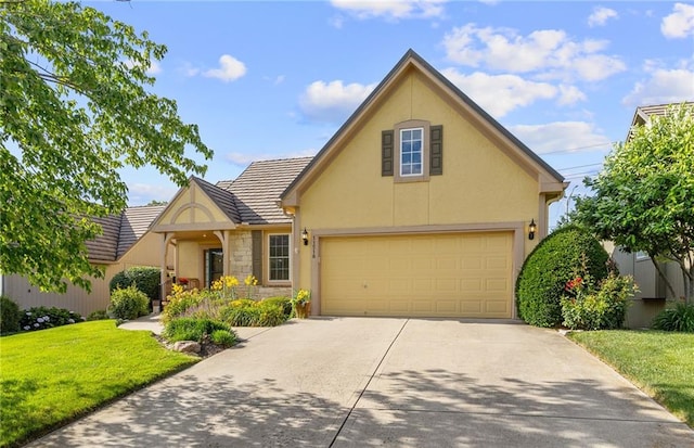 11518 W 143rd Ter, Olathe, KS 66062 - view of front facade featuring stucco siding, driveway, a front lawn, a tile roof, and stone siding