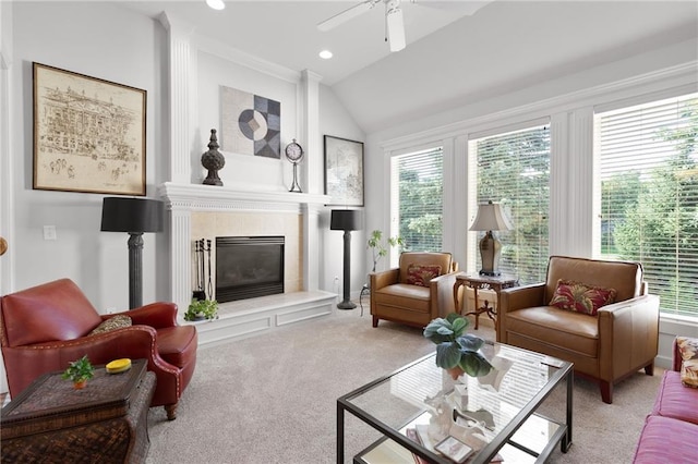 11518 W 143rd Ter, Olathe, KS 66062 - carpeted living room featuring healthy amount of natural light, lofted ceiling, a tile fireplace, a ceiling fan, and recessed lighting