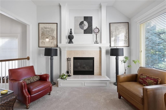 11518 W 143rd Ter, Olathe, KS 66062 - living area with carpet, plenty of natural light, a fireplace, and vaulted ceiling